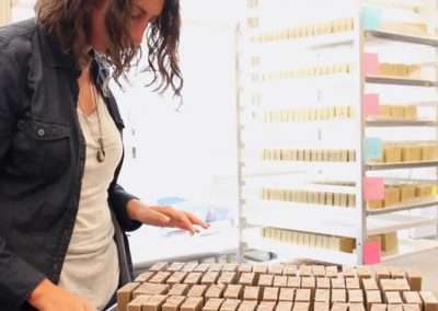 woman sorting through cosmetics