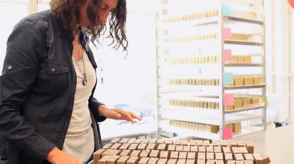 woman sorting through cosmetics