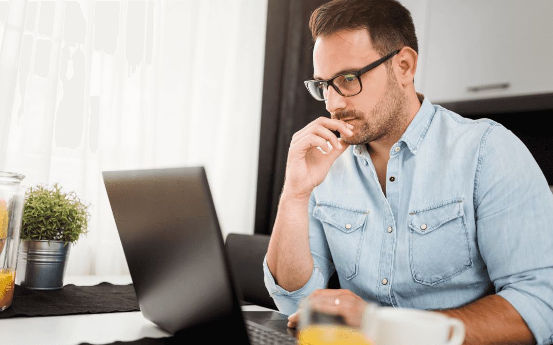 man working in his home office