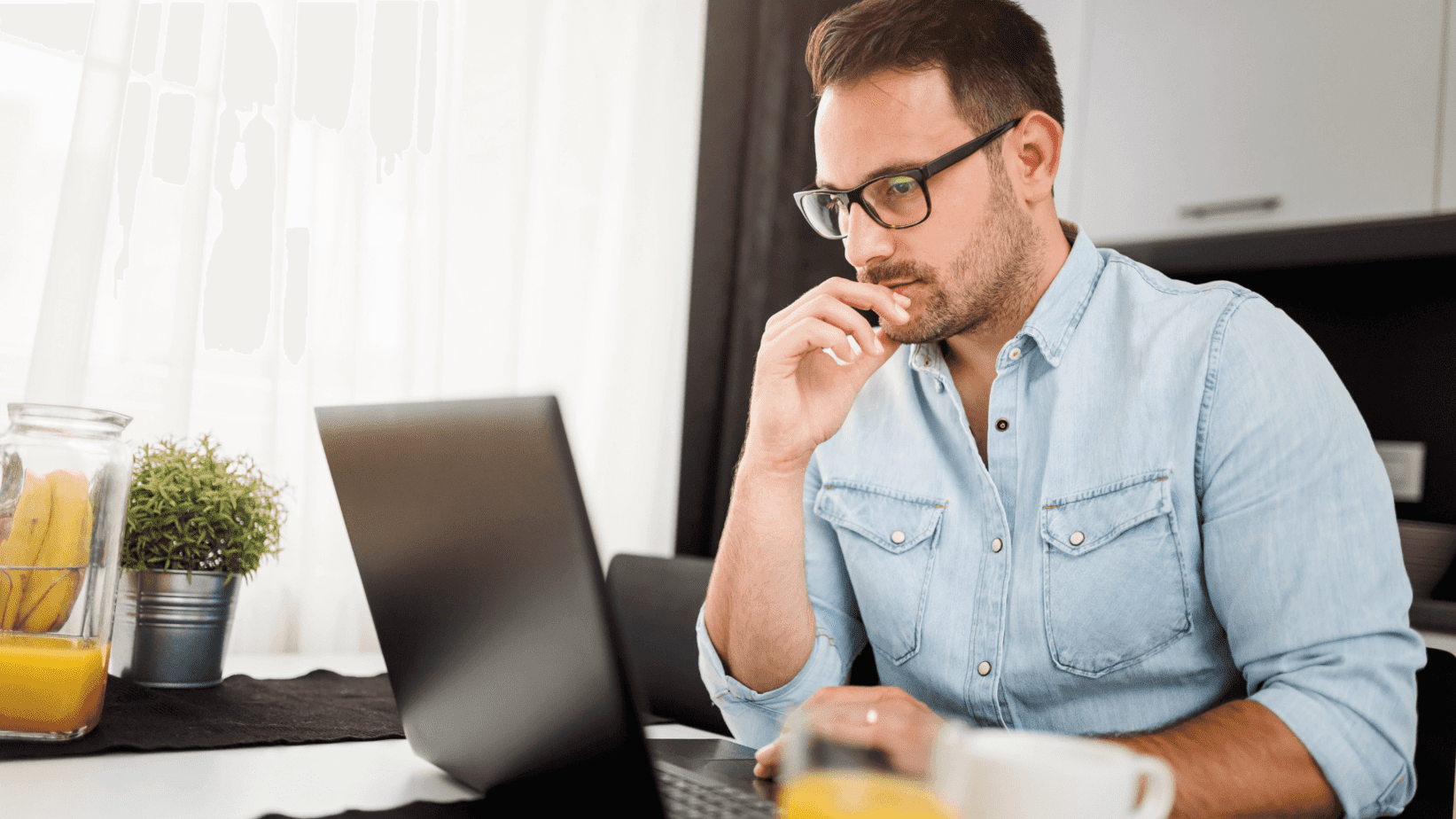 man working in his home office