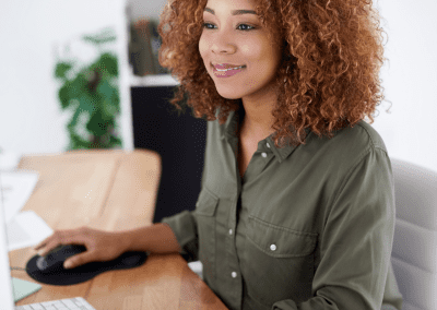 woman using a computer mouse