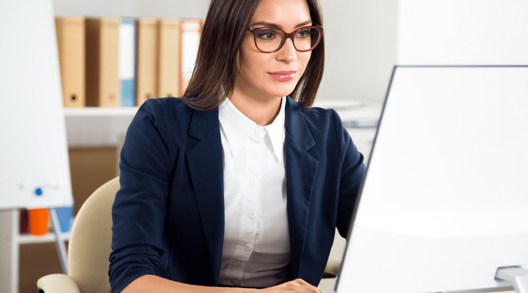 serious woman working on computer