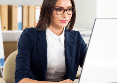 serious woman working on computer