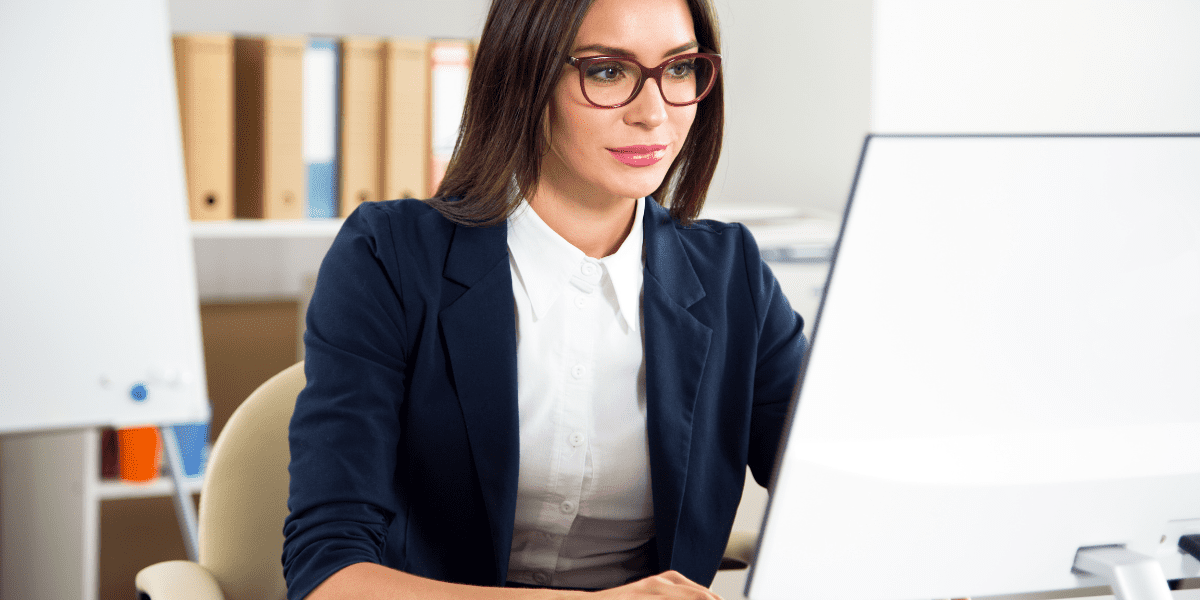 serious woman working on computer