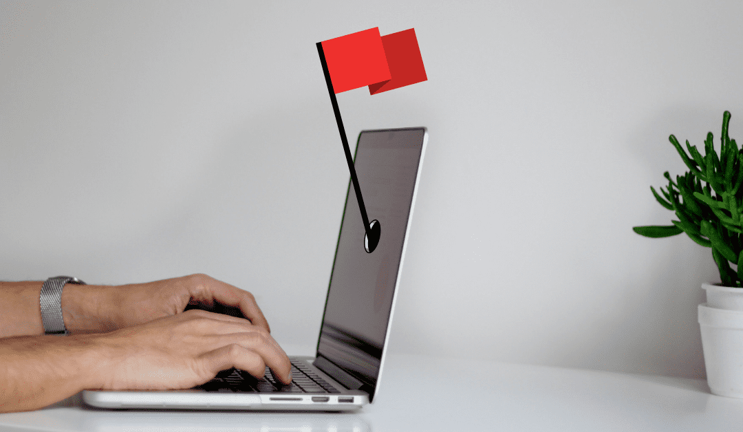 laptop and a red flag