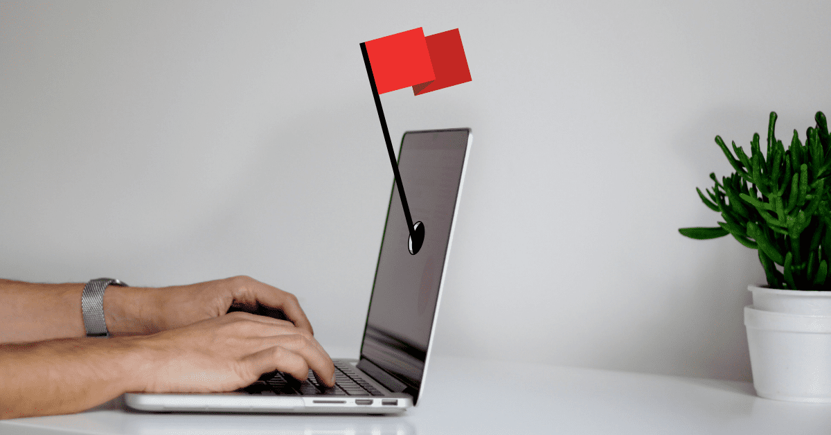 laptop and a red flag