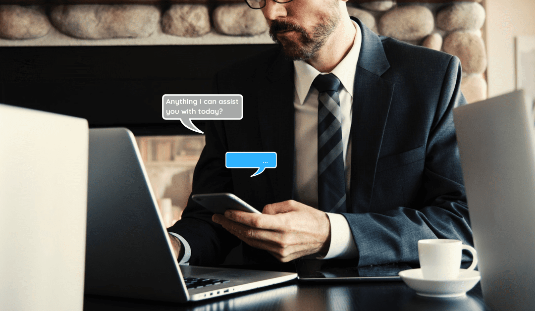 businessman working in cafe and holding cellphone