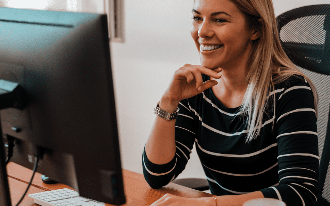 woman in office at computer