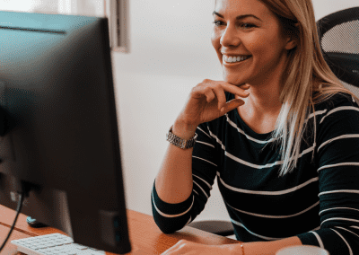 woman in office at computer