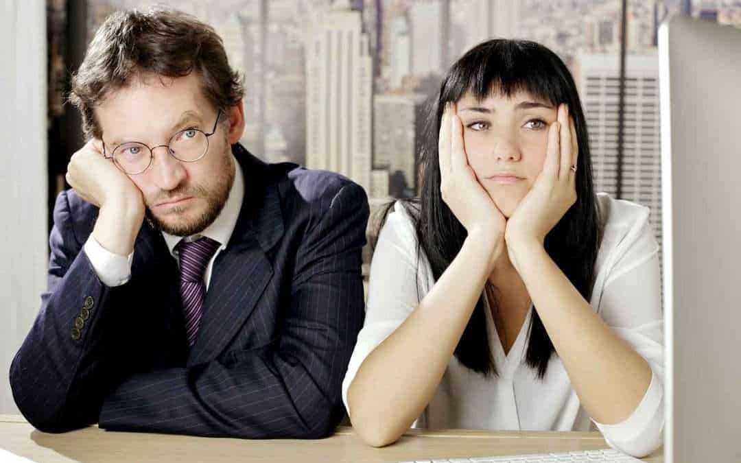 2 bored people in a meeting