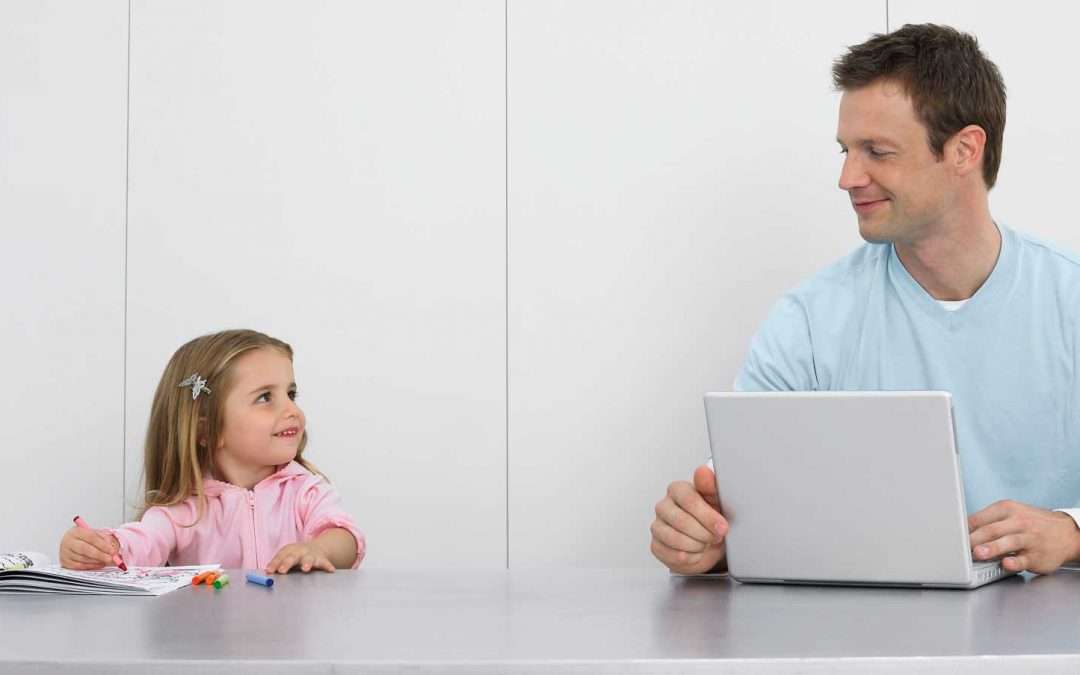 Father sitting with daughter