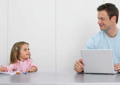 Father sitting with daughter