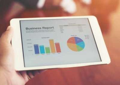 business graphs and charts on a tablet