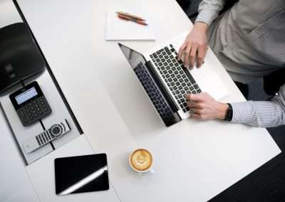 man in office working on computer