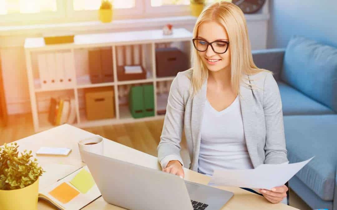 woman at desk with laptop