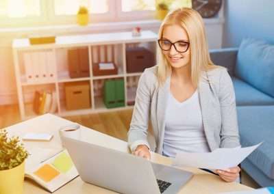 woman at desk with laptop