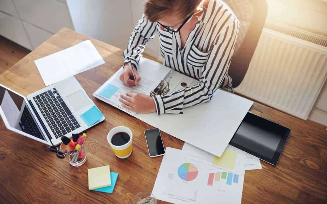 woman working solo on reports