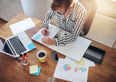 woman working solo on reports