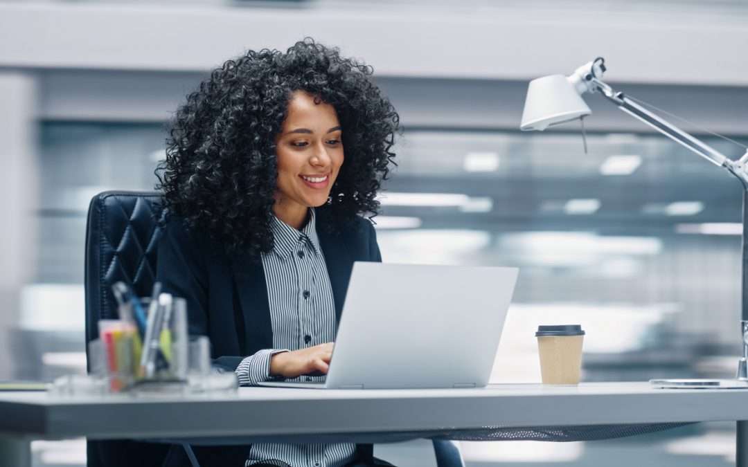 women on computer in office