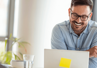 Male business owner looking at the computer