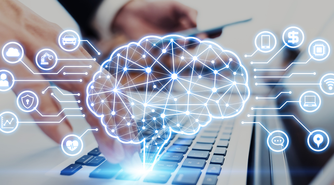 Men’s hands typing on a laptop keyboard, with a brain icon and various business icons floating around it in the background.