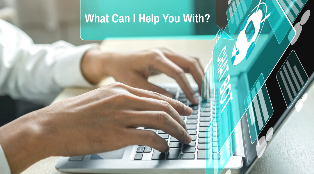 Men’s hands on a laptop with a teal screen showing a white chatbot icon. A speech bubble from the laptop says, “What can I help you with?”