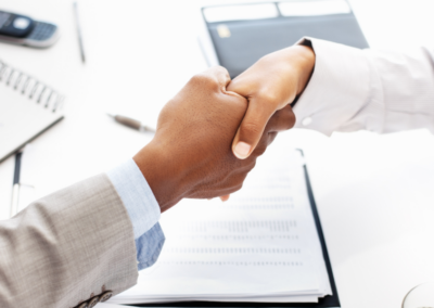 Handshake between a man and a woman.