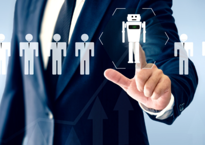 Man in a business suit pointing at a robot icon among a line of human icons.