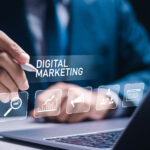 Litigation Attorney using laptop with virtual digital marketing icons.