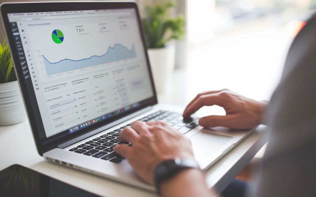 Personal Injury attorney working at laptop showing marketing data and graphs.