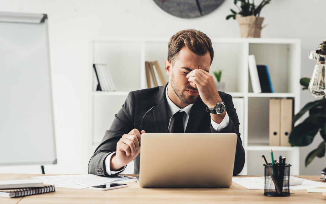 Tired attorney at desk.