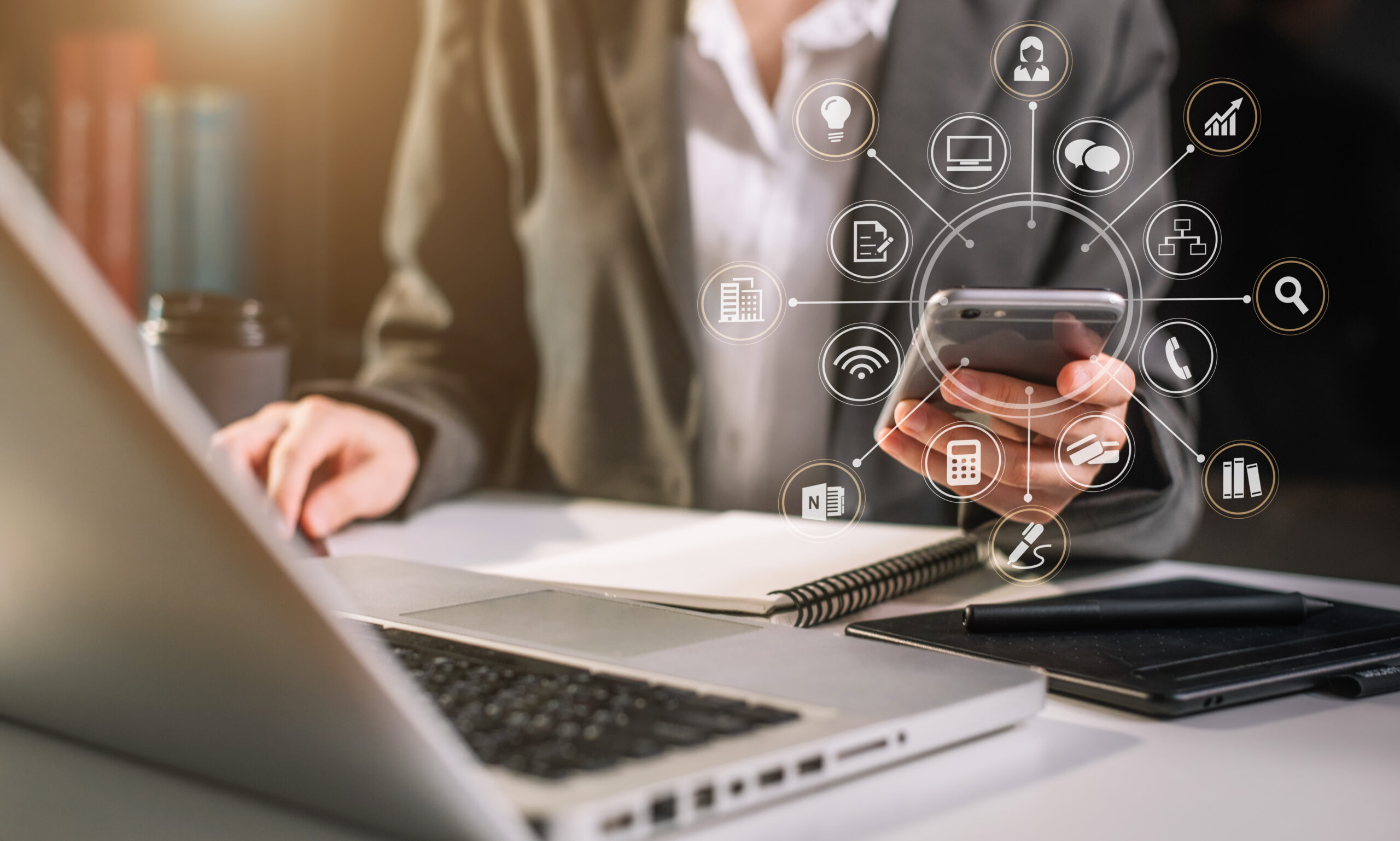 Attorney working with smart phone and laptop